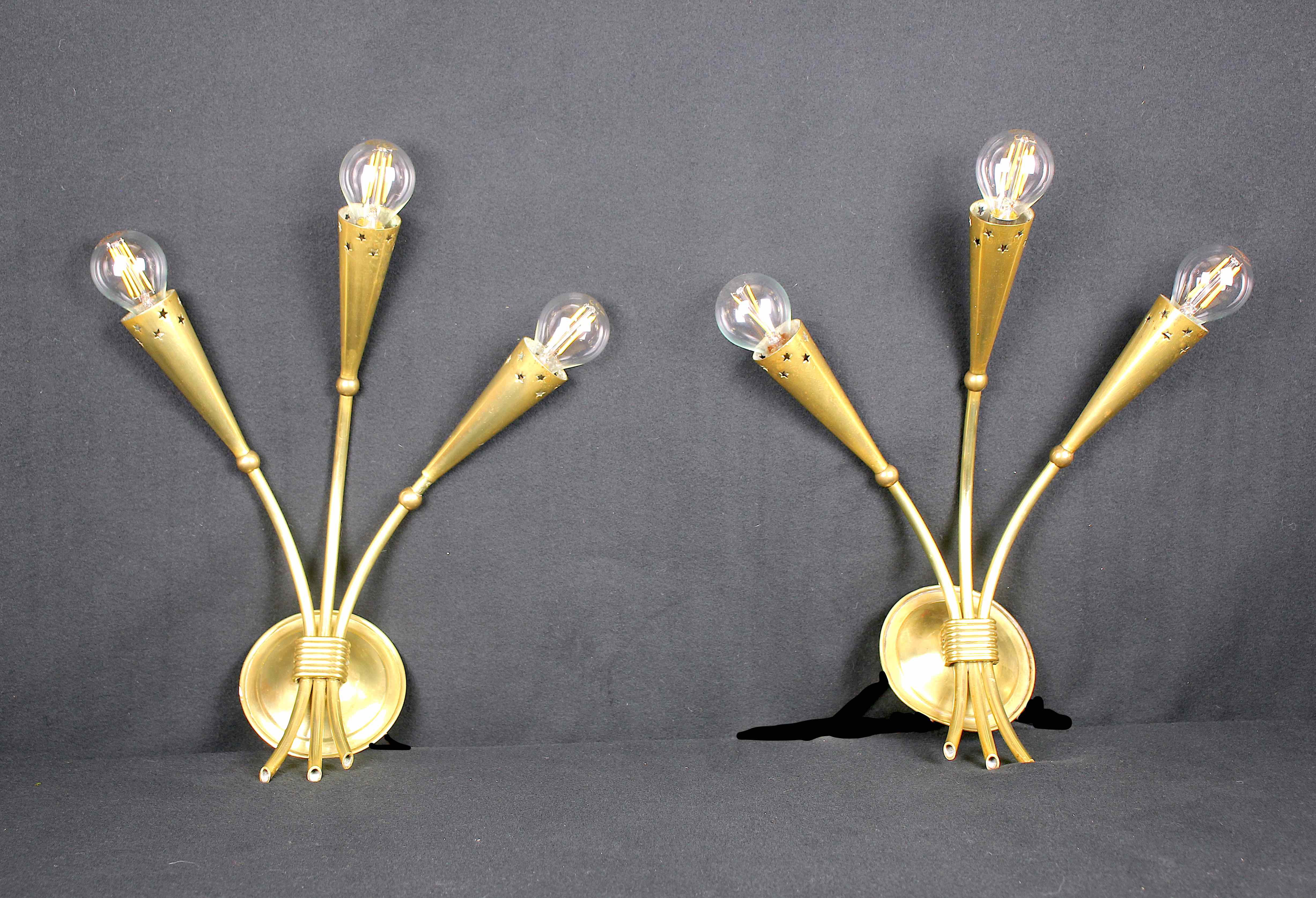 Three gilded brass sconces, Maison Lunel, France, 1950's