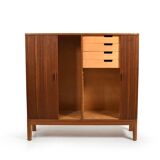 Armoire danoise à porte tambour en teck des années 1950