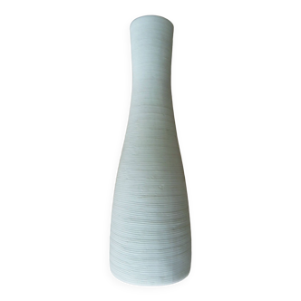 White ceramic vase with fine streaks