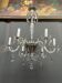 Venetian chandelier decorated with clear crystal and rare coloured crystal.