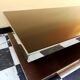 Designer coffee table in glass and chrome metal.