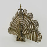 Old chimney fire barrier in fan. Gilded bronze. XIXth