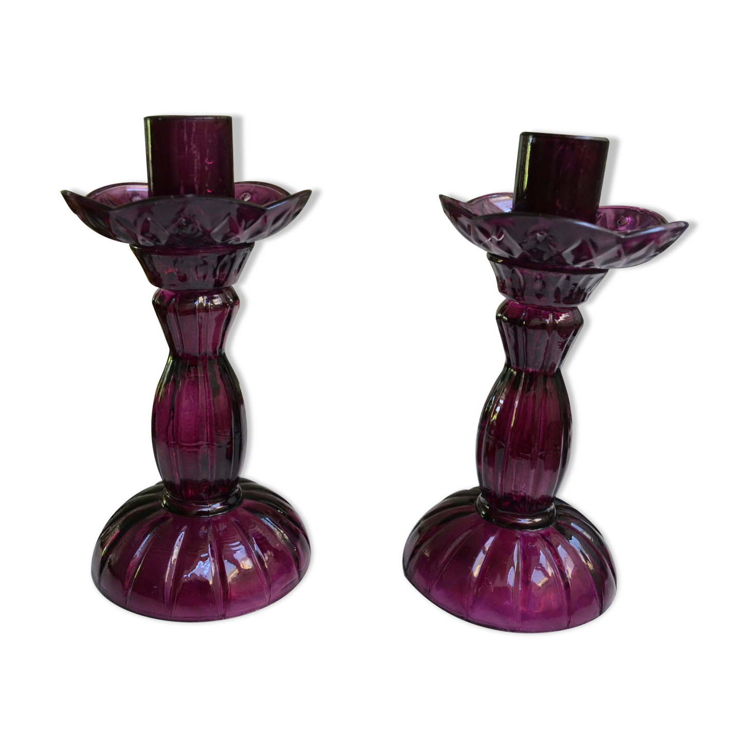 Pair of purple glass candlesticks
