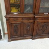 Glass-fronted walnut bookcase