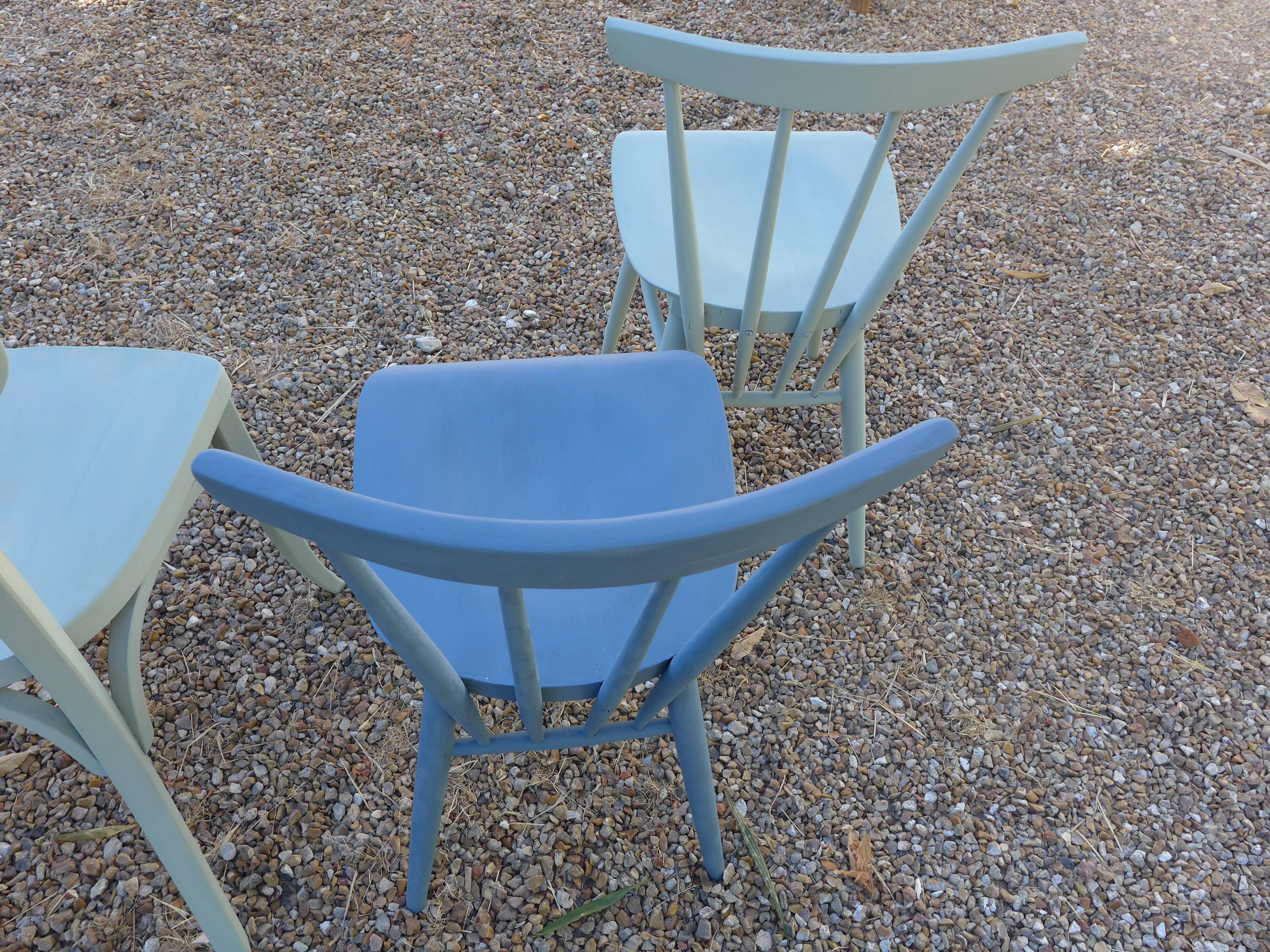 Set of 4 mismatched blue chairs