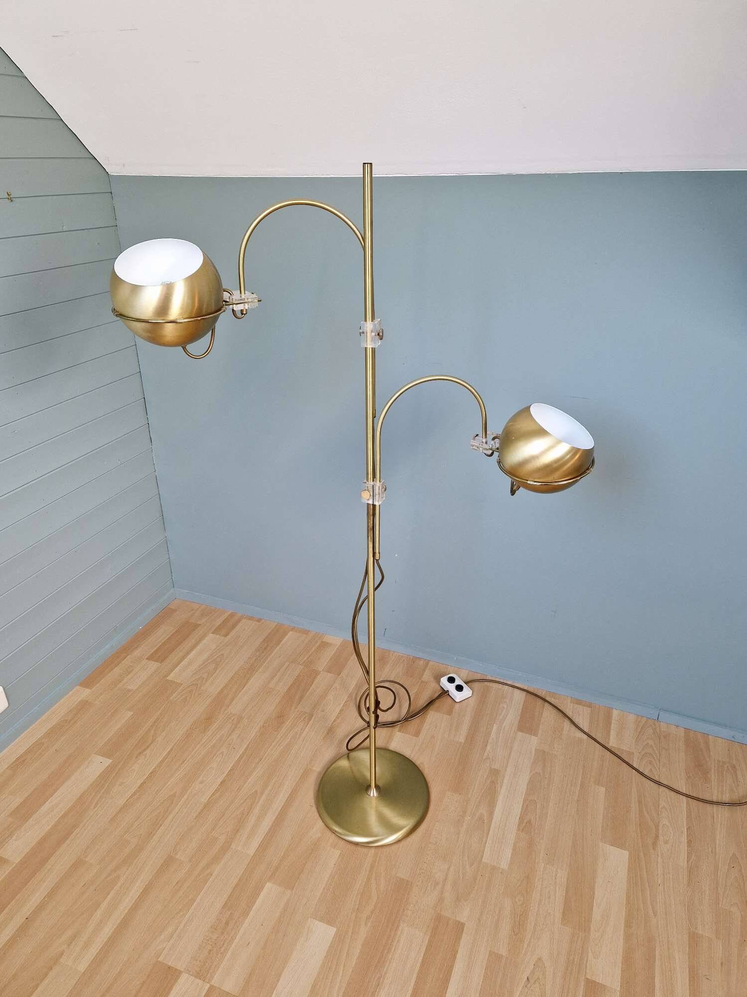 Brass eyeball floor lamp, by Gepo, 1960s-70s.