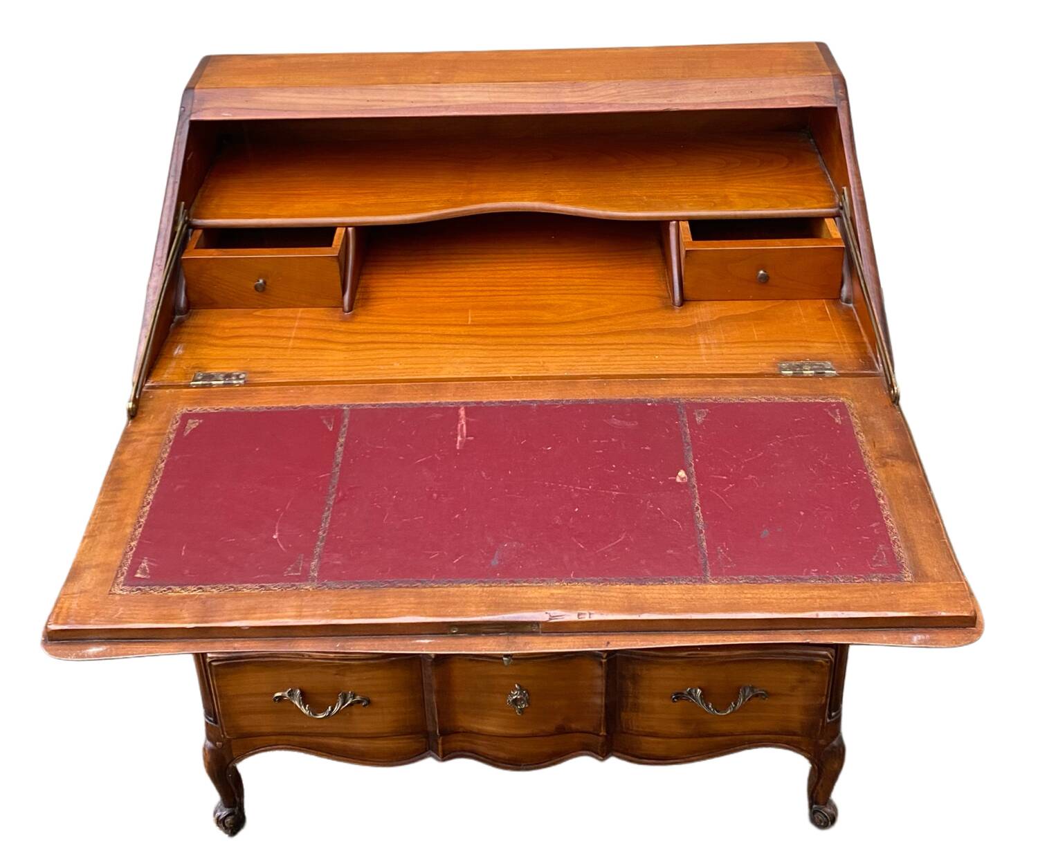 Secretary desk called "scriban" in Louis XV style made of fruitwood.