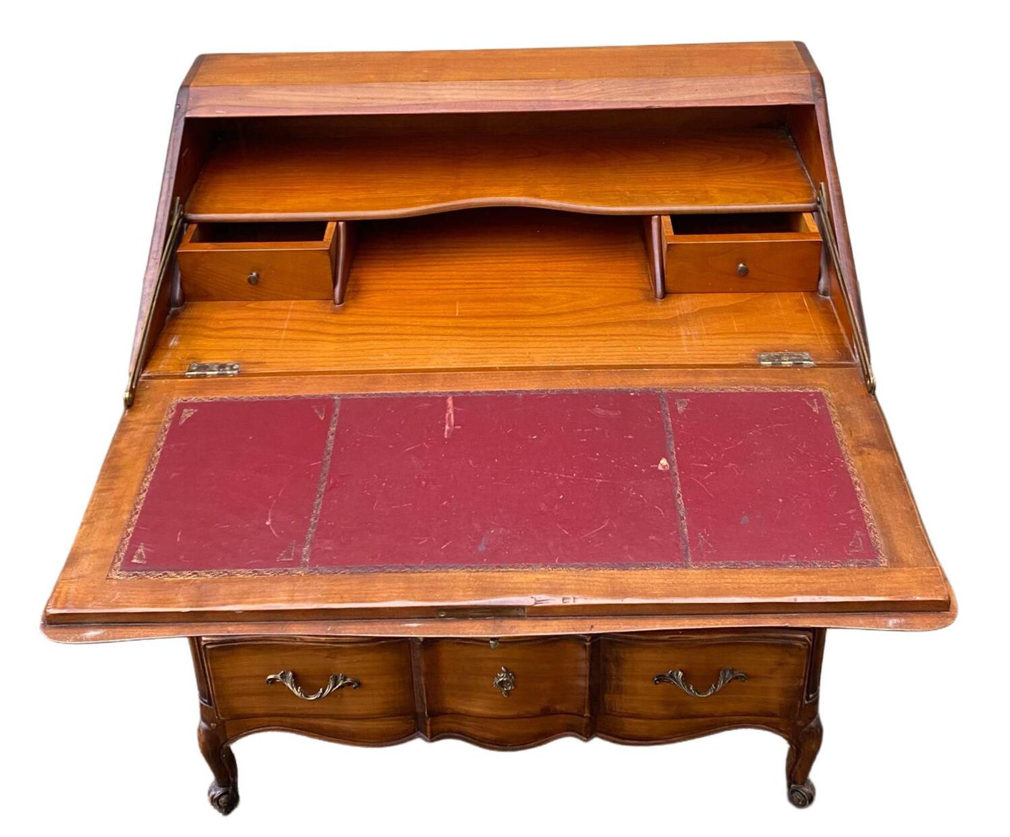 Secretary desk called "scriban" in Louis XV style made of fruitwood.