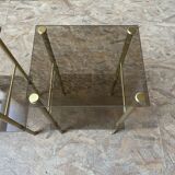 Pair of glass side tables with gilded feet