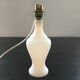 Lamp base in white opaline.