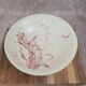 Large footed compote Gien model Iris with red floral decoration.