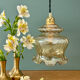 Vintage amber glass suspension globe