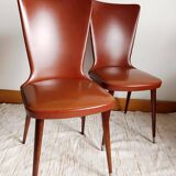 Pair of vintage vinyl chairs with splayed legs