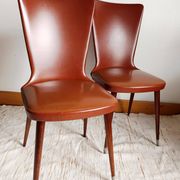 Pair of vintage vinyl chairs with splayed legs