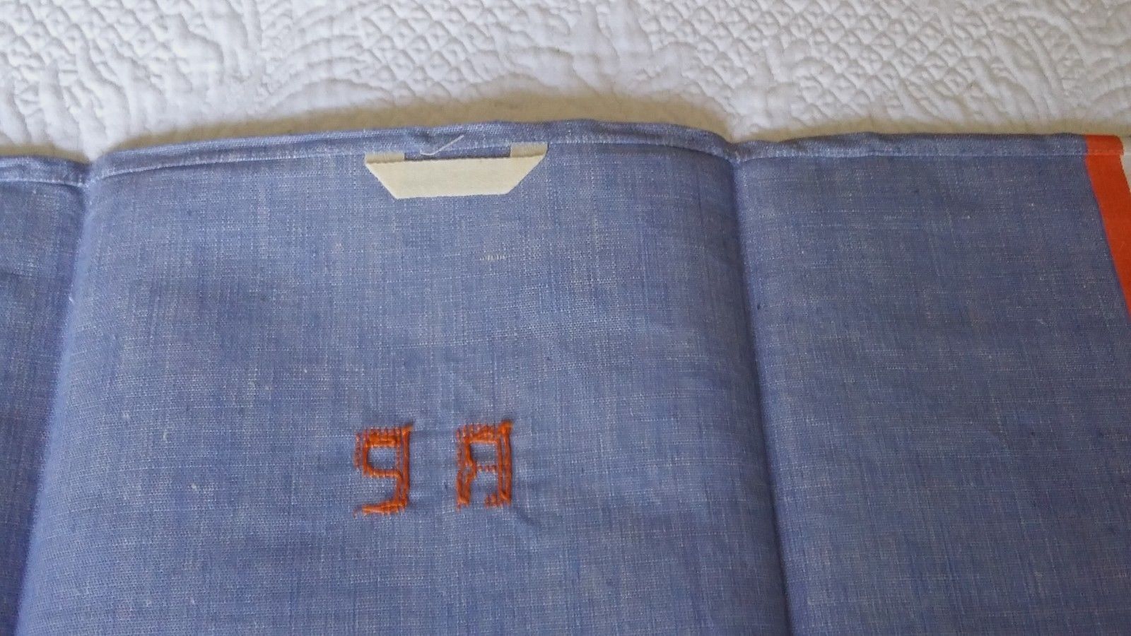 Métis old cloth embroidered Monogram R P battens blue oranges