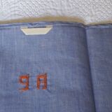 Torchon ancien métis brodé monogramme R P bleu liteaux oranges