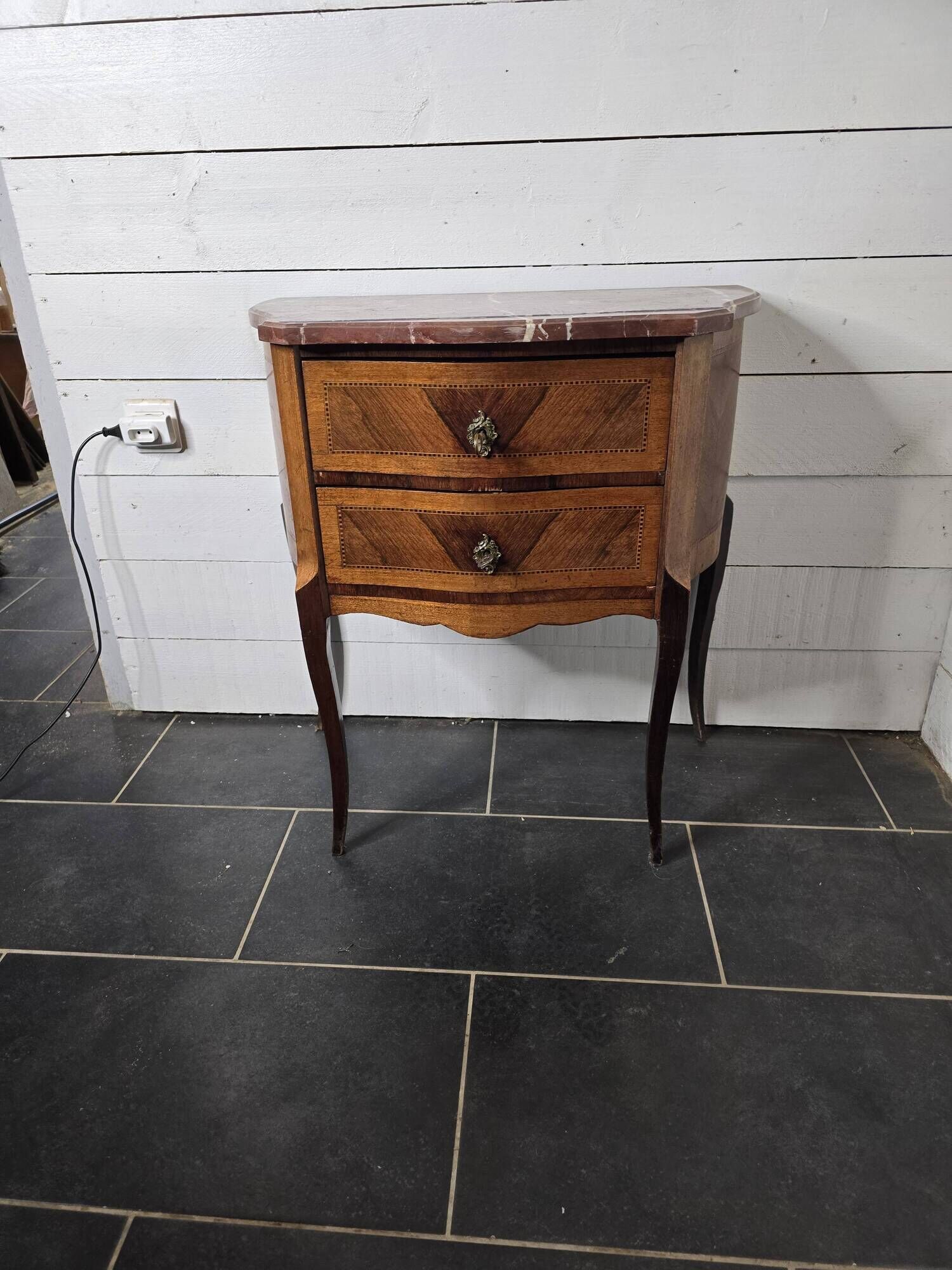 Curved chest of drawers in Louis XV style marquetry