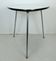 1950s three-legged COFFEE TABLE with formica top and slanted chrome legs