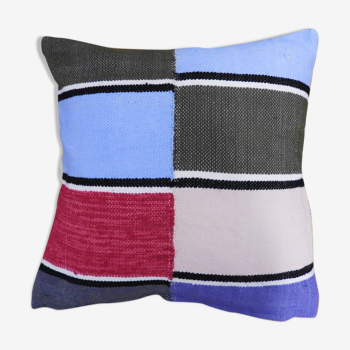 Housse de coussin tissé