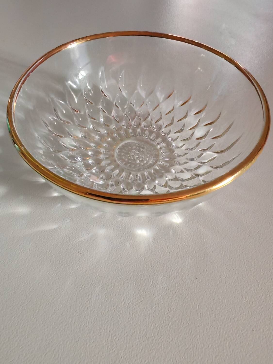 8 glass bowls with gold rim