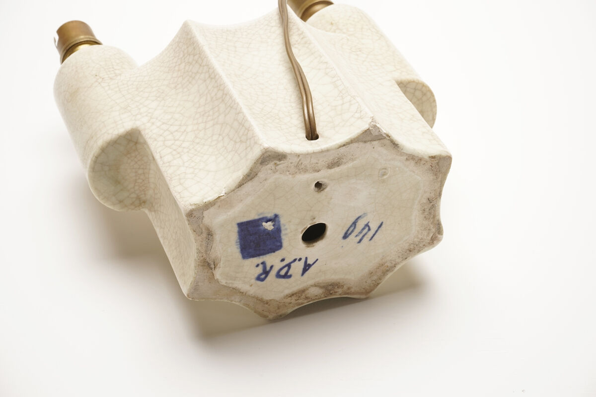 A cracked ceramic art deco lamp
