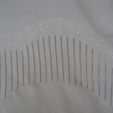 Sheet and its pillowcases in embroidered thread