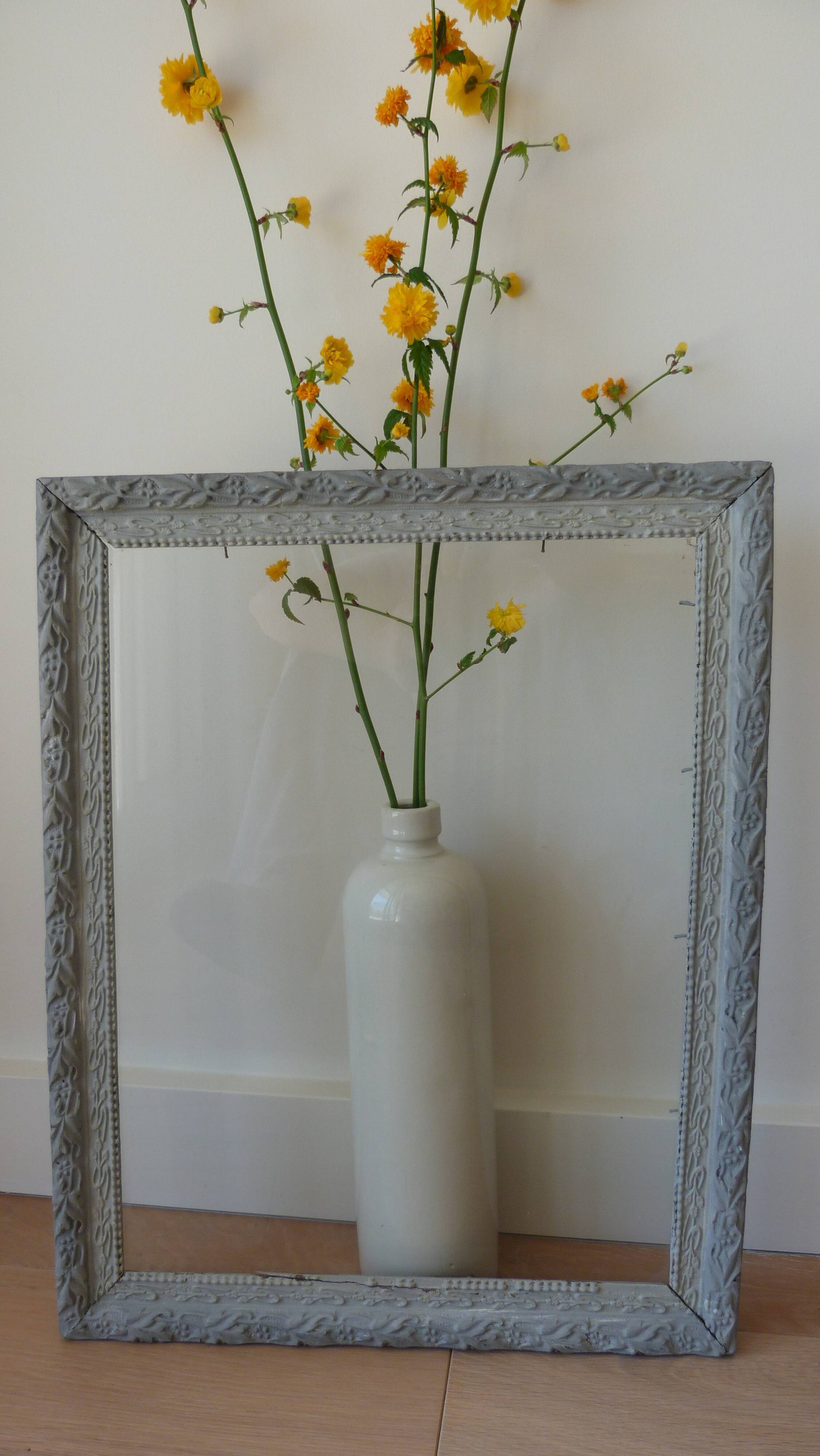 Patinated frame with glass