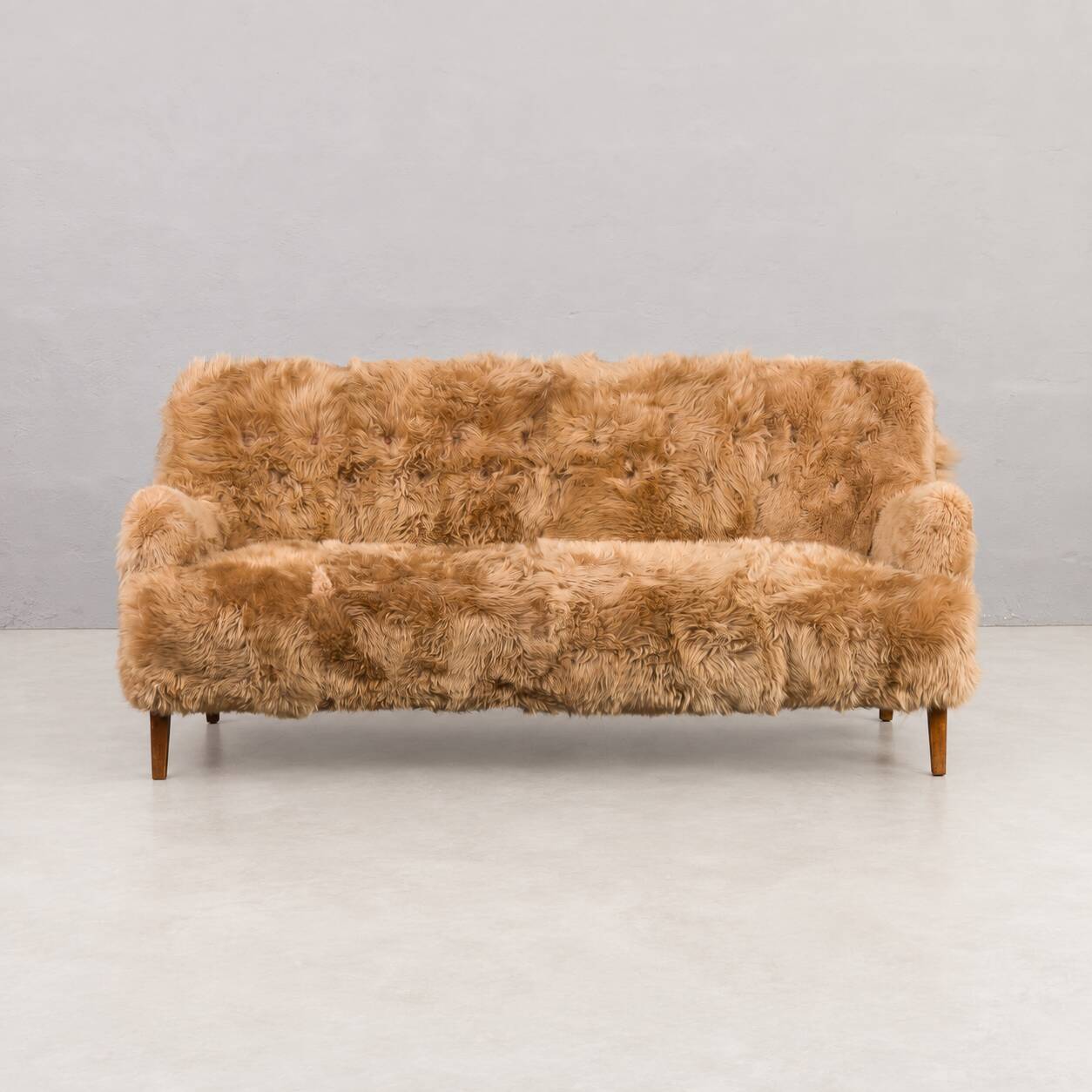 Canapé trois places Fritz Hansen de Peter Hvidt et Orla Mølgaard-Nielsen en long.