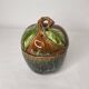Covered stoneware pot