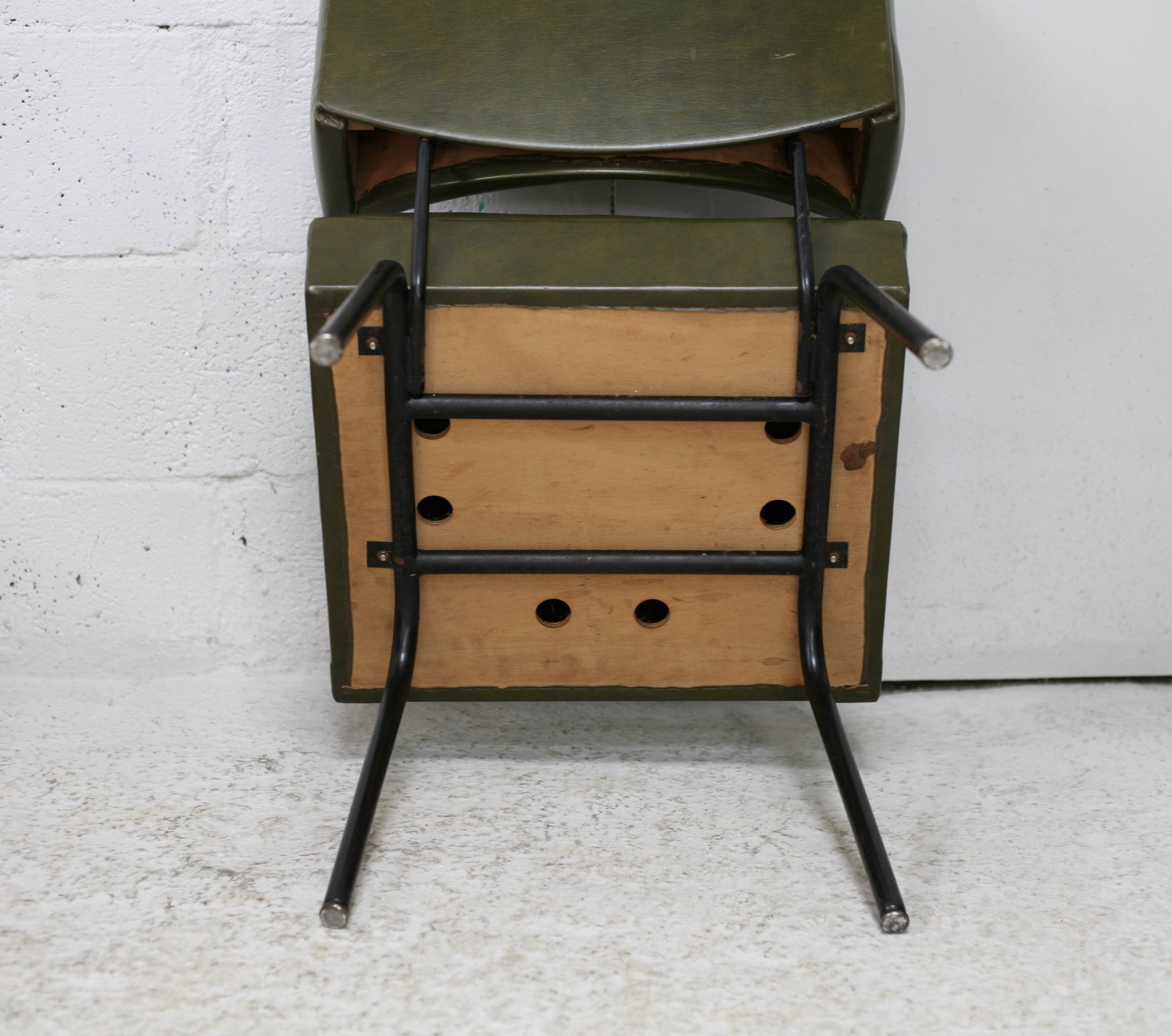 Pair of tubular armchairs, imitation leather. Circa 1950