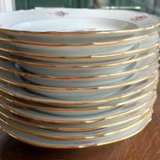 12 semi-hollow plates in Vierzon porcelain decorated with flowers and gilding