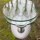 Design coffee table Naos in tempered glass and cast iron.