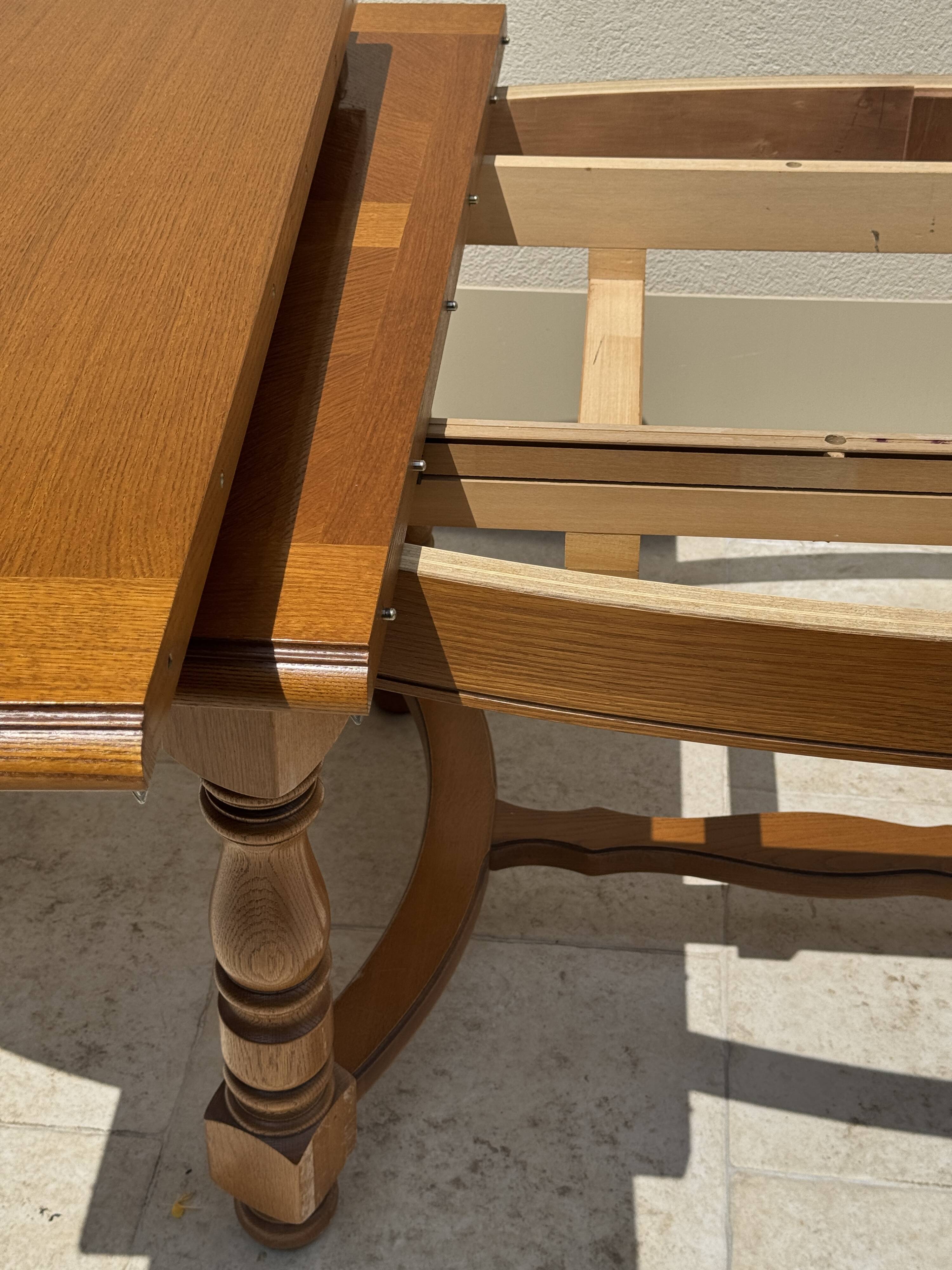 Oak dining table, oval living room table with two extensions.