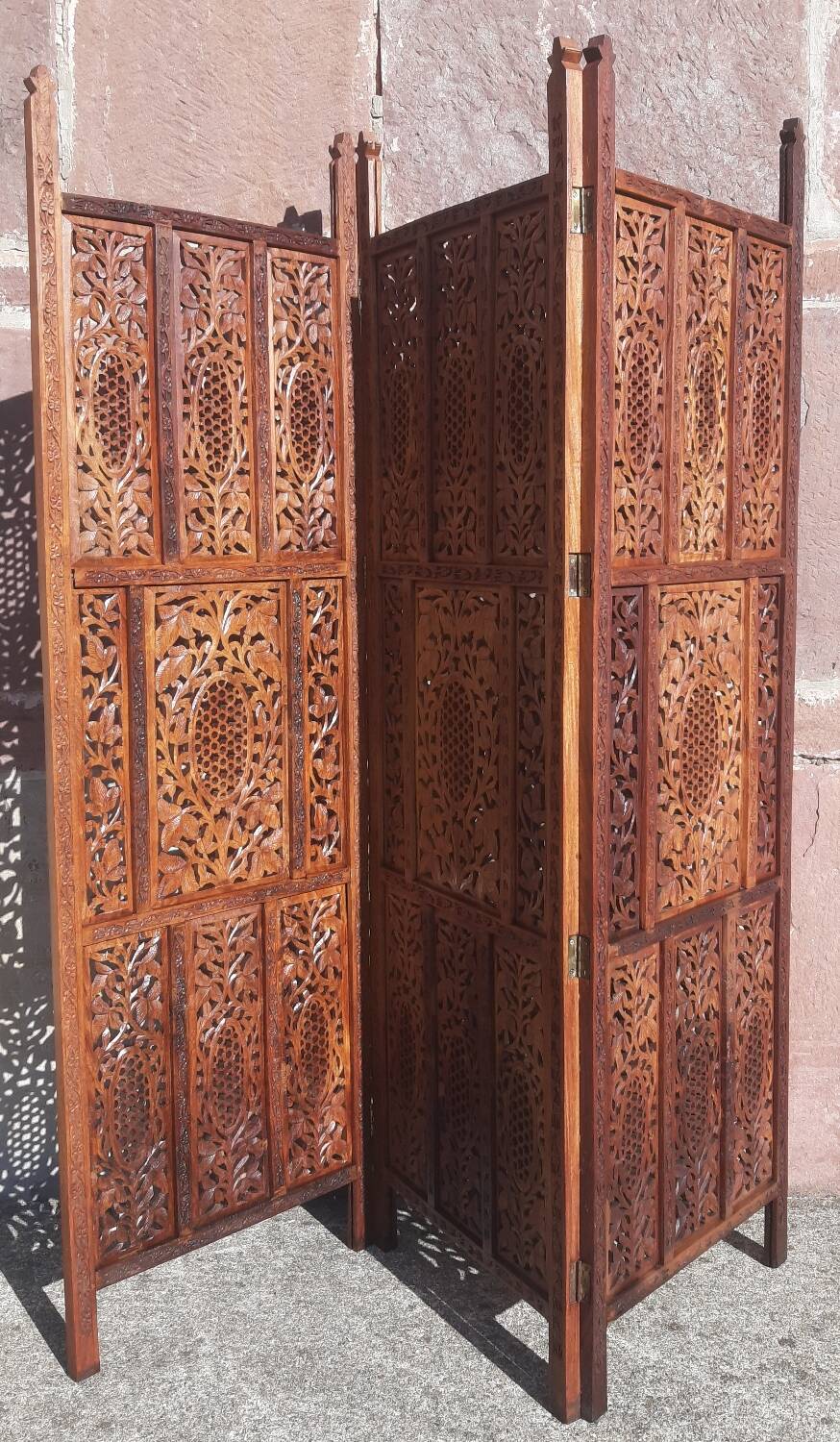 Carved solid wood screen.