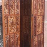 Carved solid wood screen.