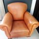 Paire de fauteuils club 1950