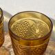 Amber stemmed glasses with vintage fruit decoration - Old brown glasses