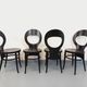Set of 4 vintage Mouette chairs by Baumann in black wood from the 1960s.