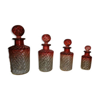 Series of 4 beautiful Baccarat bottles