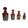 Series of 4 beautiful Baccarat bottles