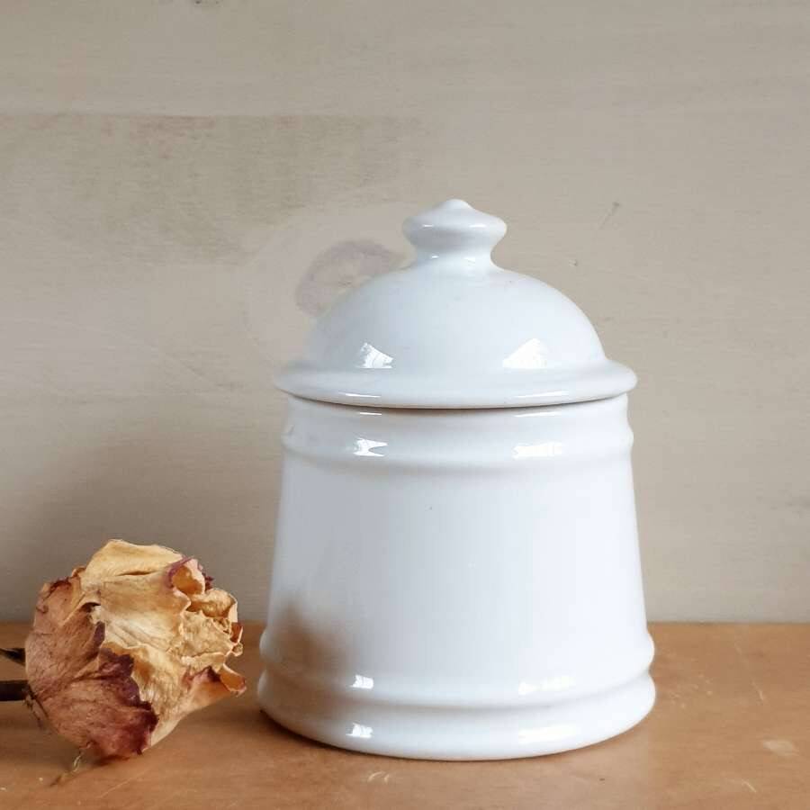 White enameled sugar bowl