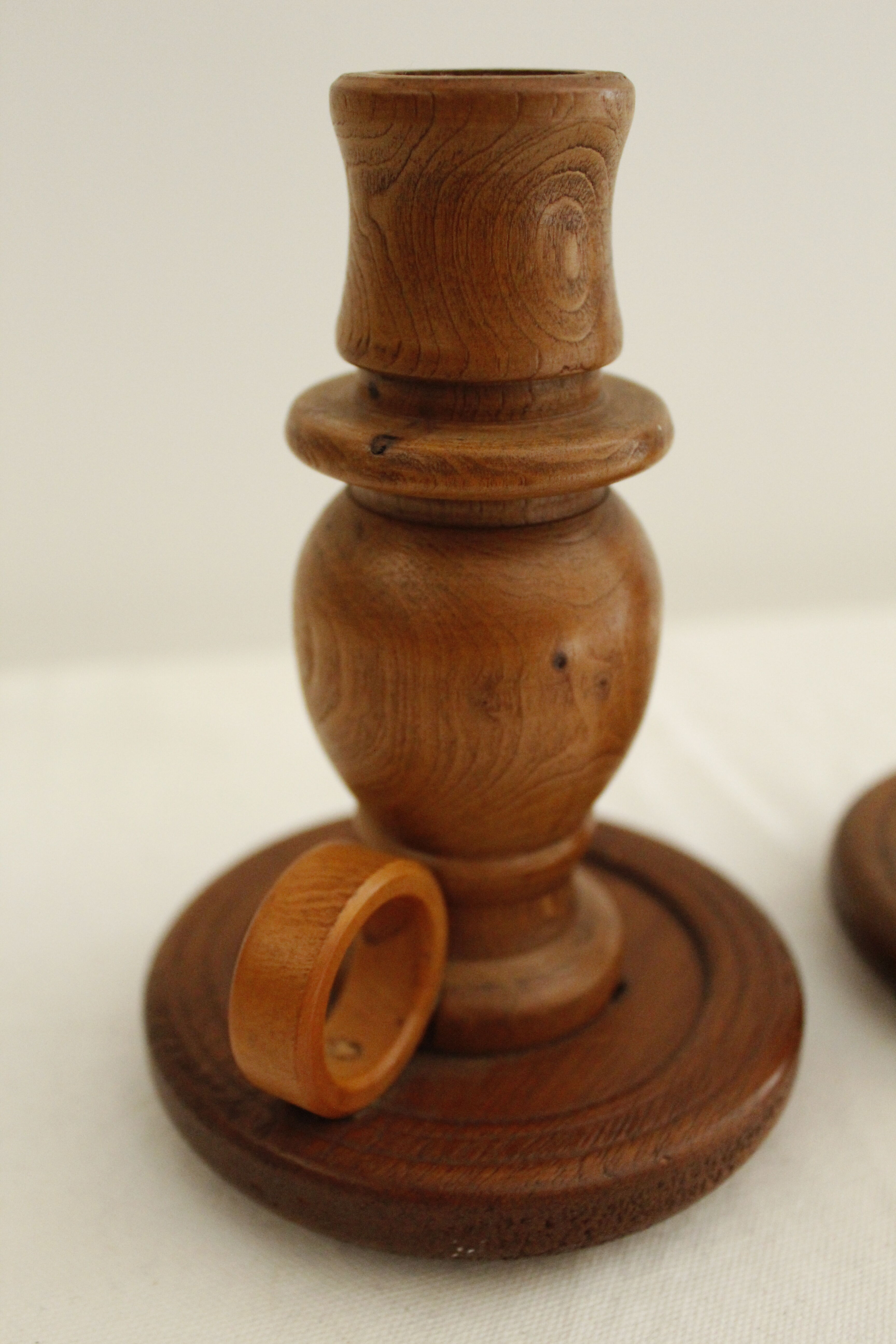 2 wooden candle holders