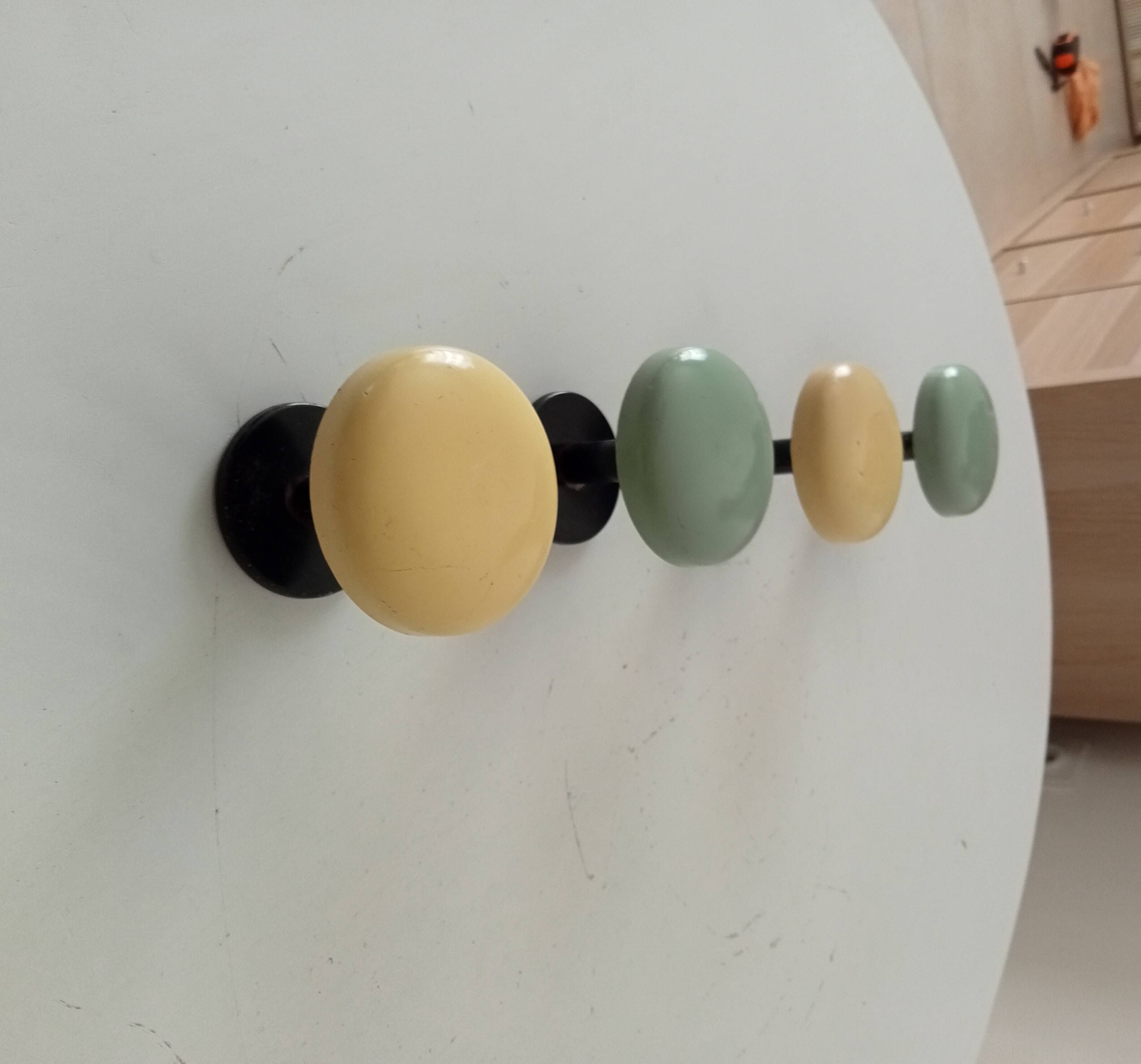 Set of 4 vintage coat hooks from the 1960s.