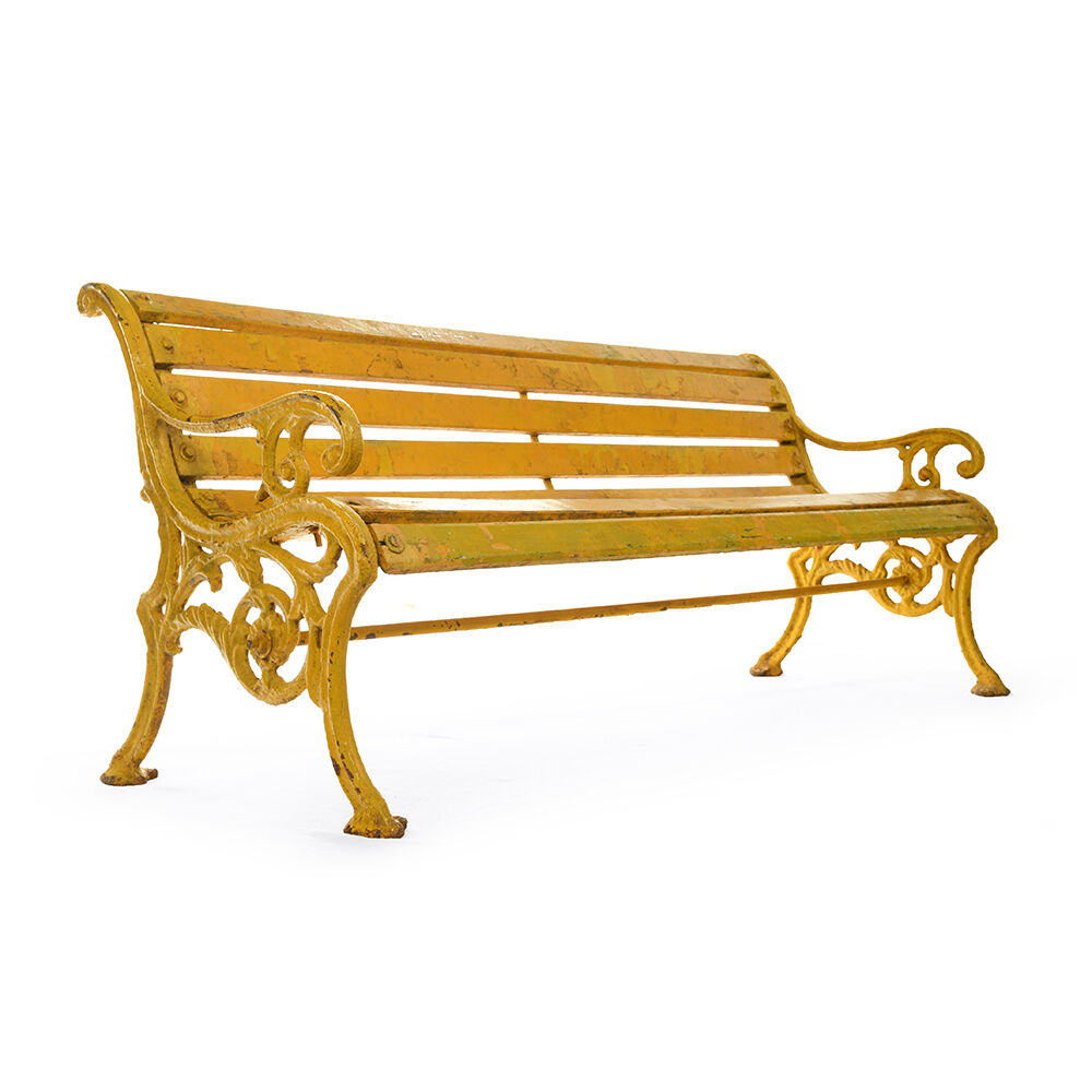 Wooden bench and yellow patina cast iron