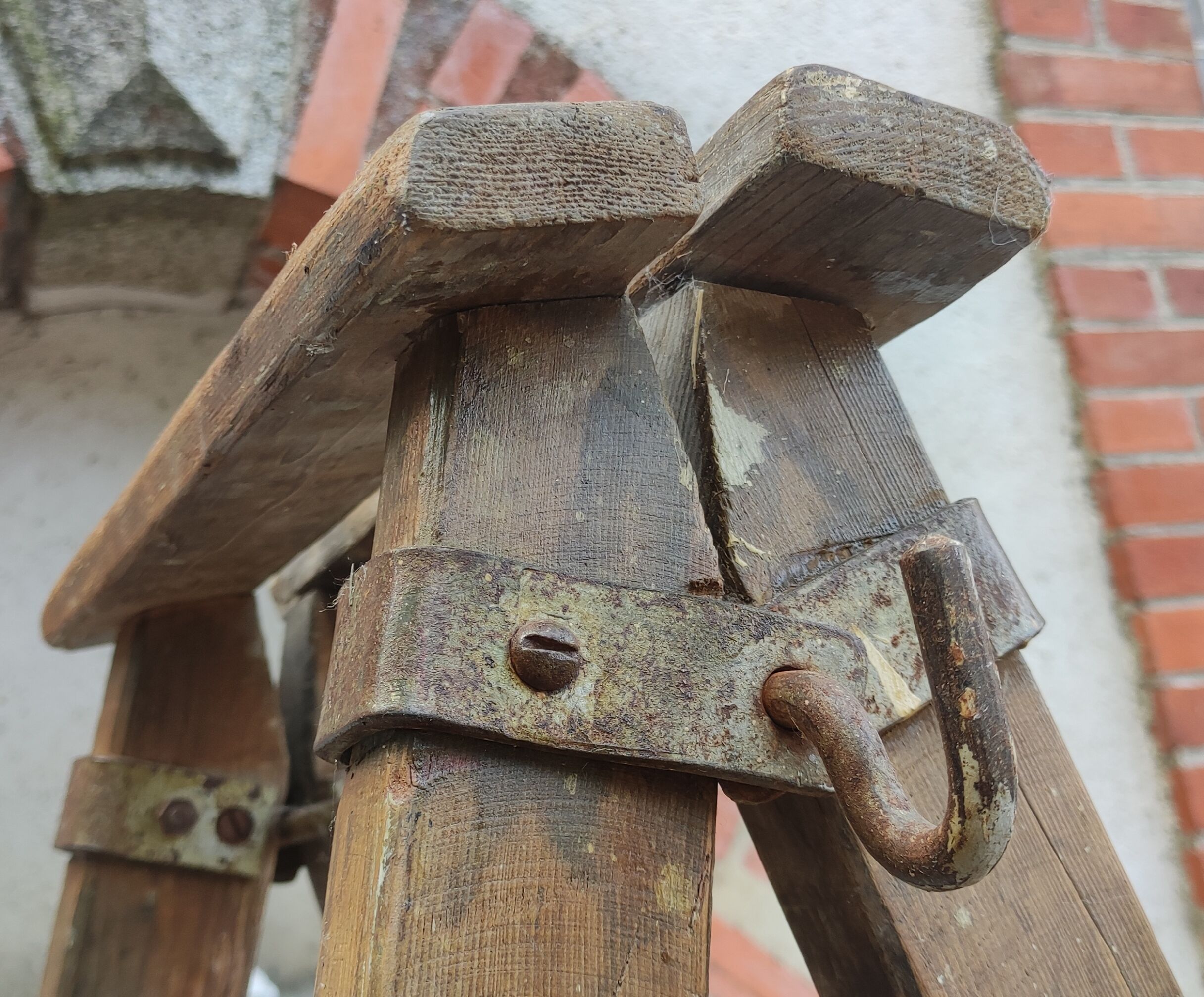 Old wooden stepladder stamped