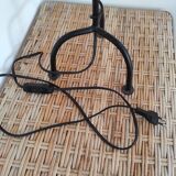 Black wrought iron table lamp and beige lampshade