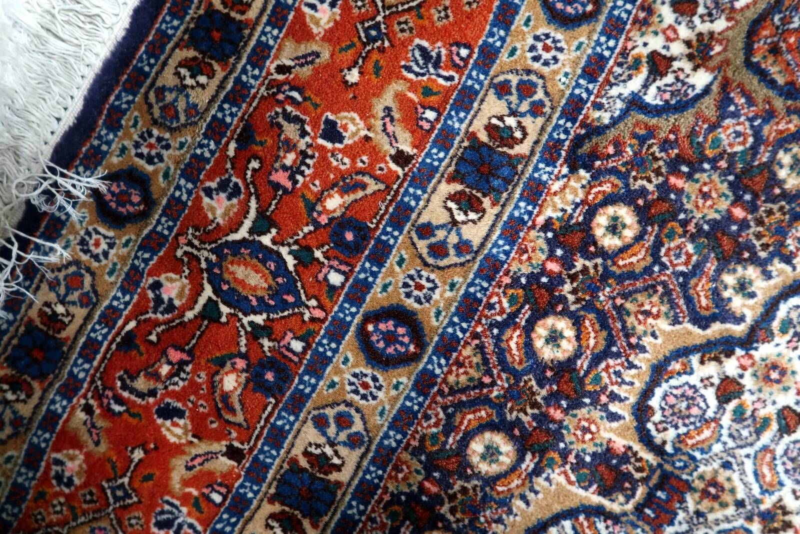 1940s handmade wool medallion rug, ivory and navy, 212 × 312 cm
