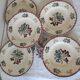 Set of 5 flat plates, signed Longwy.
