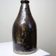 Bouteille en grès pyrité émaillé vintage artisanale signée Jean Lamy