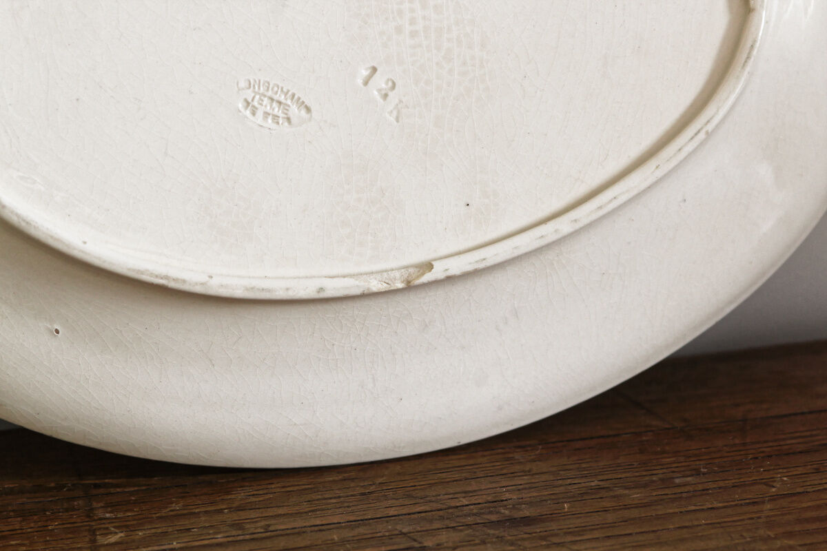 Pair of longchamp earthenware dishes, iron earth,